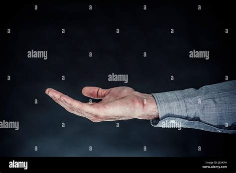 Mans Extended Hand Palm Facing Up Stock Photo Alamy