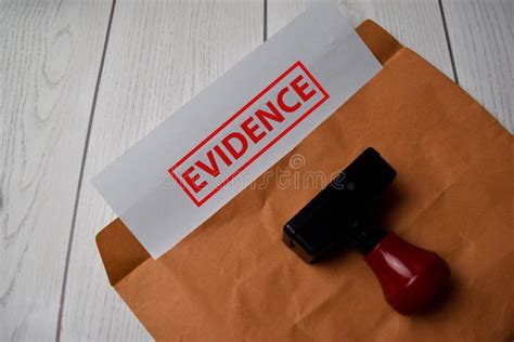 Evidence Text On Document Above Brown Isolated On Office Desk Stock