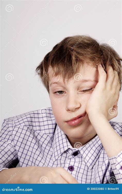 Blond Cute Schoolboy Bored And Tired After Class Boredom Stock Photo