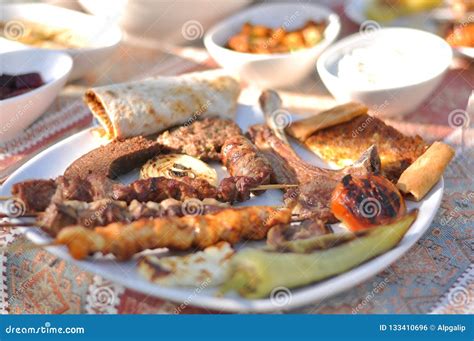 Cypriot Meze And Kebap Barbecue Party In The Garden With Delicious Mix