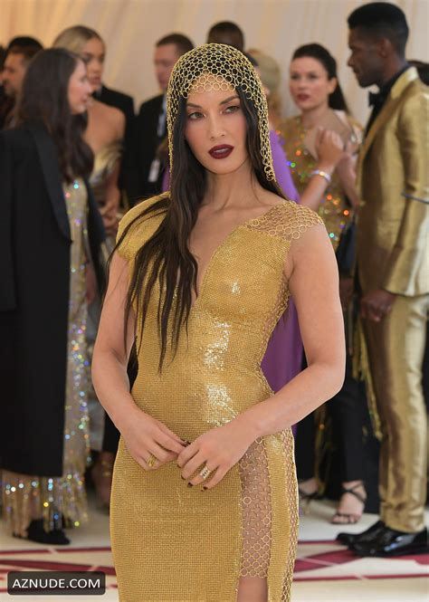 Olivia Munn Sexy On The Red Carpet Of Met Gala 2018 In A Golden Tight