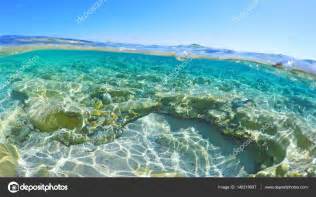 Split Underwater In Piscina Rei — Stock Photo © Alkan32 148218997