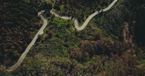 Drone Flying Over Amazing Mountain Winding Road Aerial Top View Shot