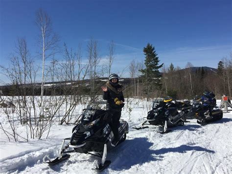 Snowmobiling In The Forks At The Center Of Maines Best Trails