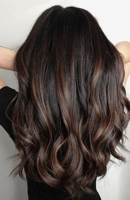 The light brown and slightly black hair make you look good. 25 Sexy Black Hair With Highlights for 2020 - The Trend ...
