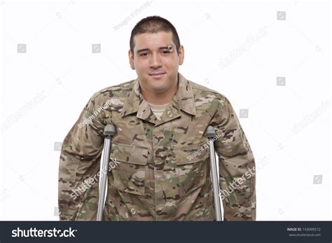 Smiling Young Soldier With Crutches Stock Photo 143099572 Shutterstock