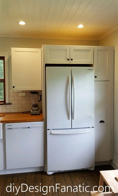 Screws through the back into the wall studs to anchor it. Mountain Cottage Kitchen, white kitchen, Kraftmaid ...