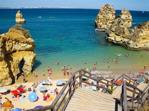 People On Beach In Lagos Portugal High Res Stock Photo Getty Images