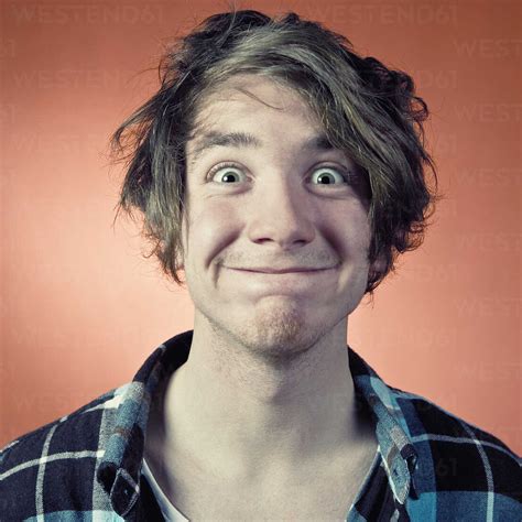 Man Pulling Funny Faces Portrait Stock Photo