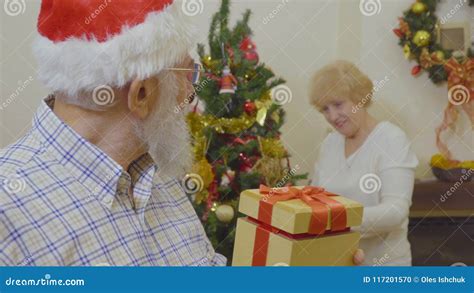 Mature Man Make Suprise For His Wife At Christmas Stock Footage Video
