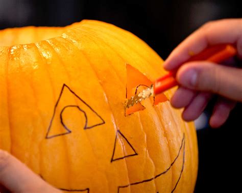 how to carve a pumpkin step by step tips for halloween season gardeningetc