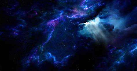 The Sky Is Filled With Blue And Purple Clouds While Stars Are Visible