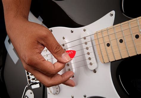 Are you looking for the best diy guitar kits? DIY Guitar Pick Punch | DudeIWantThat.com