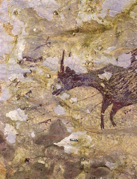Ancient Rock Art Of Mythical Half Human Creatures Hunting Animals Is
