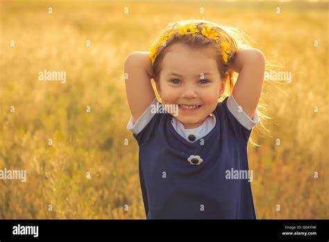 The Beautiful Little Girl In A Blue Dress Against Stock Photo Alamy