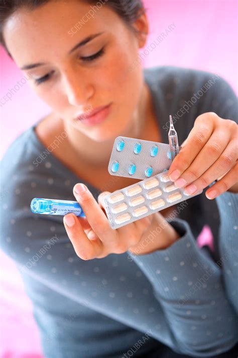 Woman Holding Medications Stock Image C0310548 Science Photo Library