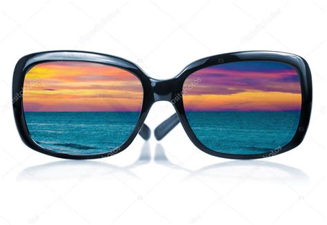 Sunglasses Reflecting A Sunset At The Sea — Stock Photo © Kmiragaya