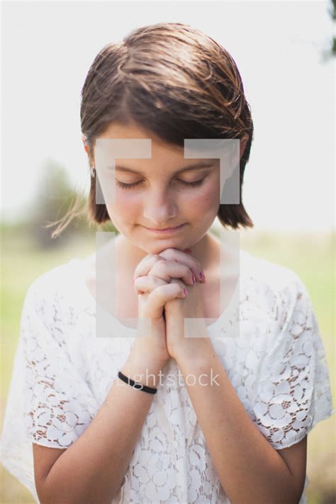 Young Girl With Praying Hands — Photo — Lightstock