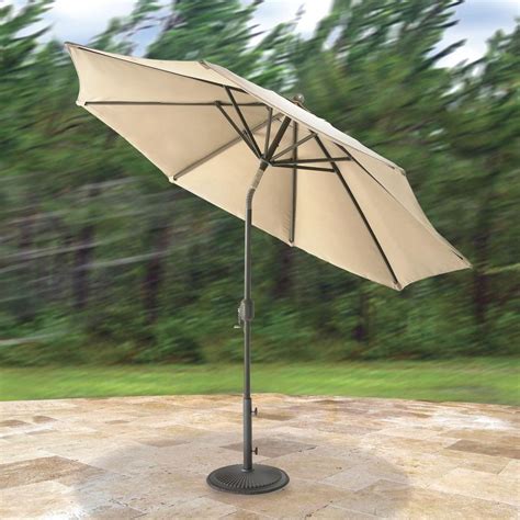 The Wind Adapting Market Umbrella Hammacher Schlemmer