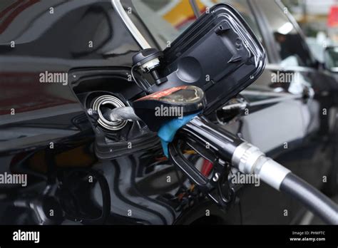 Pumping Gasoline Fuel In Car Stock Photo Alamy
