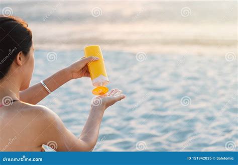 Woman Using Sun Lotion On The Beach Stock Image Image Of Background