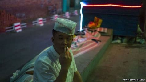 beijing public smoking ban begins bbc news