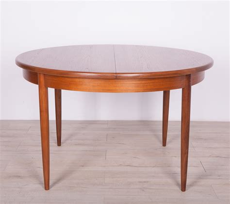 3' 3 1/2 x 6' 4 1/2 for a table. Round Teak Fresco Dining Table from G-Plan, 1960s | #131984