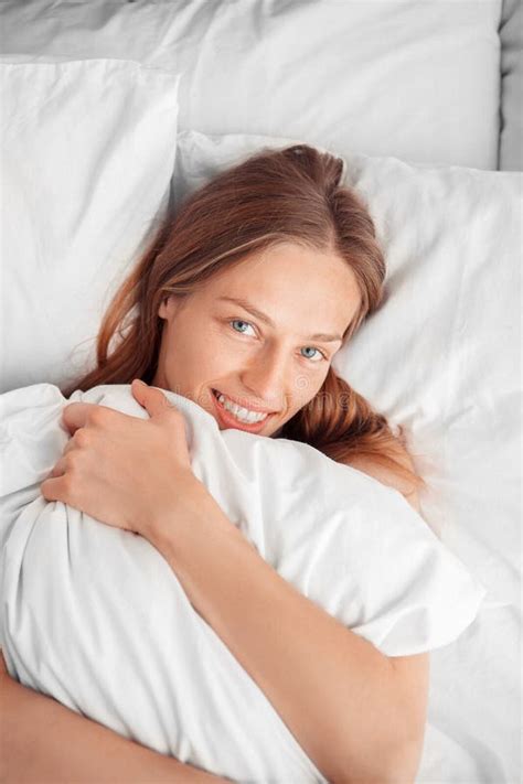 Morning At Home Woman Lying On Bed Hugging Pillow Smiling Toothy Top