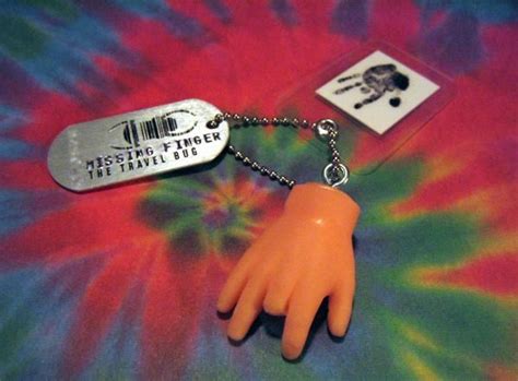 Tbkfy6 Travel Bug Dog Tag The Missing Finger Of Jerry Garcia