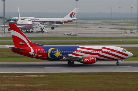 Flight though, so as pss says, just choose whichever that has flight times that suits you. File:Air Asia Boeing 737-300 Malaysian Flag MRD.jpg ...