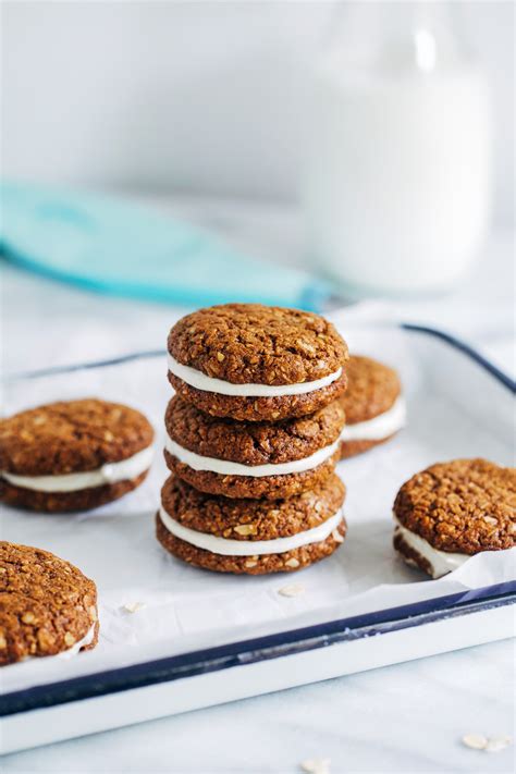 Each cookie sandwich is made of two soft & chewy oatmeal cookies filled with a thick layer of vegan vanilla buttercream for melt in your mouth cookie goodness. Vegan Oatmeal Cream Pies - Making Thyme for Health