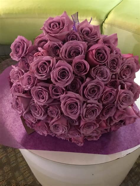 5 Dozen Lavender Roses Wrapped Bouquet By Downtown Flowers Net