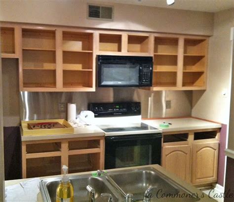 You'll have to remove the doors from the cabinets, for starters. spray paint kitchen cabinets. Best tutorial so far ...