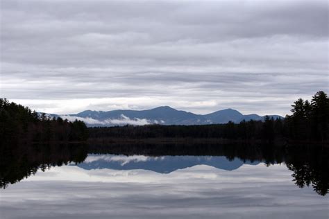 Free Images Body Of Water Reflection Sky Nature Highland Loch