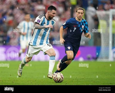 Argentina S Lionel Messi Left And Croatia S Lovro Majer Battle For The Ball During The Fifa