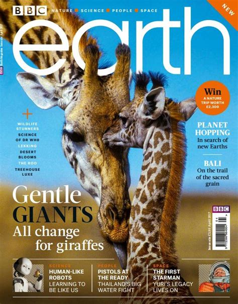 Two Giraffes Standing Next To Each Other On A Magazine Cover