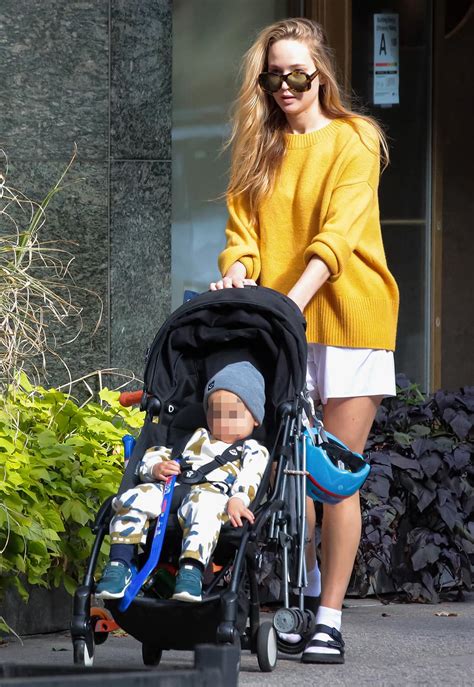 Jennifer Lawrence Embraces Mommy Duty In Yellow Sweater Before Dressing