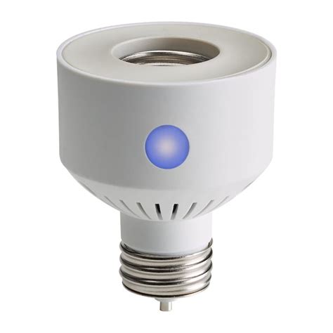 Tork 60 Watt White Medium Light Socket Adapter In The Light Socket