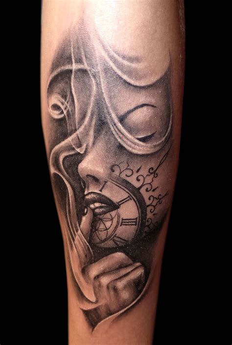 A Man With A Clock Tattoo On His Leg And Face Is Shown In Black And White