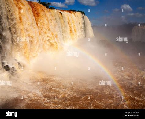 Rainbow At Iguazu Falls One Of The Biggest Falls In The World Paraná