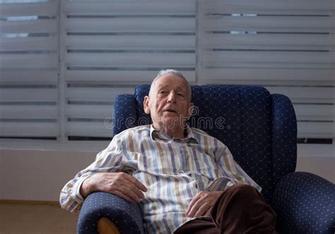 Old Man Sitting In Armchair Stock Image Image Of Illness Portrait