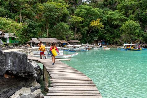 Tourists Visiting The Kayangan Lake At Coron Island Palawan