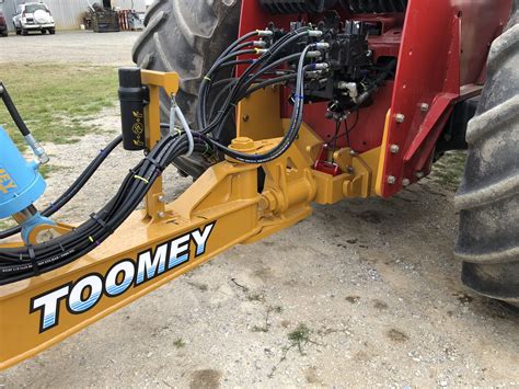 Scrapers Features — Toomey Earthmovers