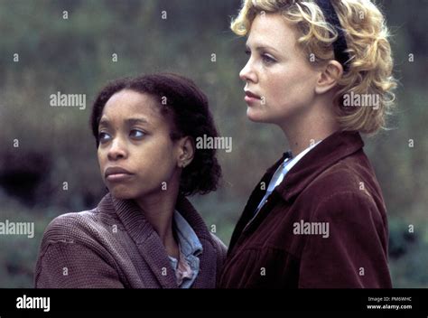 Film Still From The Cider House Rules Erykah Badu Charlize Theron © 1999 Miramax Films Photo