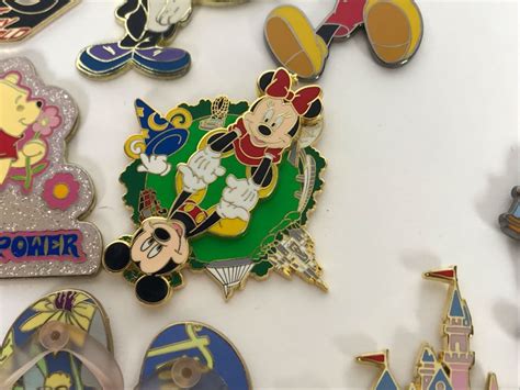 collection of walt disney disneyland pins trading pins