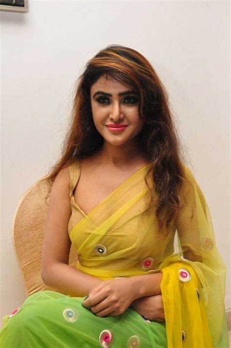 sony charishta sexy photoshoot stills in green yellow saree