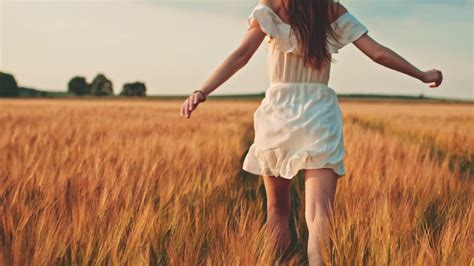 Beautiful Girl Running On Sunlit Wheat Field Slow Motion 120 Fps Freedom Concept Happy Woman
