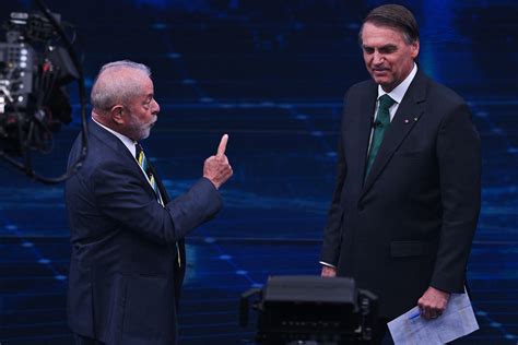 Bolsonaro And Lula Exchange Blows In Debate Prior To The Second