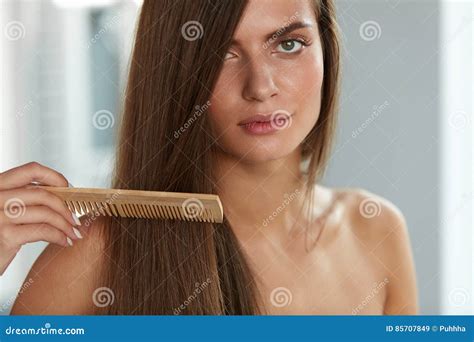 Brushing Hair Woman Hairbrushing Beautiful Long Hair With Comb Royalty