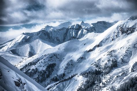 Snow Covered Mountain Peaks In Colorado Photograph By Rob
